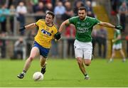 12 July 2015; Ciaran Murtagh, Roscommon, in action against Ryan McCluskey, Fermamagh. GAA Football All-Ireland Senior Championship, Round 3A, Fermamagh v Roscommon, Brewster Park, Fermanagh. Photo by Sportsfile