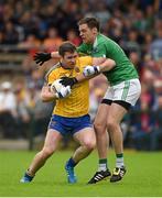 12 July 2015; Cathal Cregg, Roscommon, in action against Richard O'Callaghan, Fermamagh. GAA Football All-Ireland Senior Championship, Round 3A, Fermamagh v Roscommon, Brewster Park, Fermanagh. Photo by Sportsfile