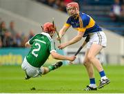 12 July 2015; Alan Tynan, Tipperary, in action against Tom Hayes, Limerick. Electric Ireland Munster GAA Hurling Minor Championship Final, Limerick v Tipperary. Semple Stadium, Thurles, Co. Tipperary. Picture credit: Piaras Ó Mídheach / SPORTSFILE