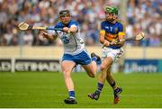 12 July 2015; James Woodlock, Tipperary, in action against Kevin Moran, Waterford. Munster GAA Hurling Senior Championship Final, Tipperary v Waterford. Semple Stadium, Thurles, Co. Tipperary. Picture credit: Piaras Ó Mídheach / SPORTSFILE