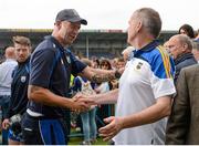 12 July 2015; Waterford selector Dan Shanahan shakes hands with Tipperary manager Eamon O'Shea after the game. Munster GAA Hurling Senior Championship Final, Tipperary v Waterford. Semple Stadium, Thurles, Co. Tipperary. Picture credit: Piaras Ó Mídheach / SPORTSFILE