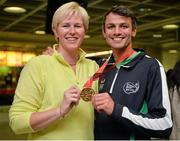13 July 2015; Ireland's Thomas Barr pictured with his coach Hayley Harrison in Dublin Airport on his arrival home from the World University Games in Gwangju South Korea. Dublin Airport, Dublin. Picture credit: Piaras Ó Mídheach / SPORTSFILE