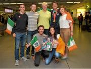 13 July 2015; Ireland's Thomas Barr pictured with his training group, from clockwise, David O'Shea, Eoin Synnott, Hayley Harrisson, Clare Murphy, Jessie Barr and Paul Byrne, in Dublin Airport on his arrival home from the World University Games in Gwangju South Korea. Dublin Airport, Dublin. Picture credit: Piaras Ó Mídheach / SPORTSFILE