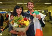 13 July 2015; Ireland's Thomas Barr pictured with his mother Martina in Dublin Airport on his arrival home from the World University Games in Gwangju South Korea. Dublin Airport, Dublin. Picture credit: Piaras Ó Mídheach / SPORTSFILE