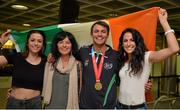 13 July 2015; Ireland's Thomas Barr pictured with his sisters Becky, left, and Jessie, right and his mother Martina in Dublin Airport on his arrival home from the World University Games in Gwangju South Korea. Dublin Airport, Dublin. Picture credit: Piaras Ó Mídheach / SPORTSFILE