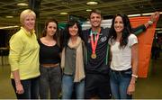 13 July 2015; Ireland's Thomas Barr pictured with, from left, Hayley Harrison, coach, Becky, sister, Martina, mother, and Jessie, sister, in Dublin Airport on his arrival home from the World University Games in Gwangju South Korea. Dublin Airport, Dublin. Picture credit: Piaras Ó Mídheach / SPORTSFILE