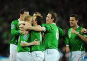 15 October 2008; Robbie Keane, Republic of Ireland, is congratulated by team-mates, from left, Damien Duff, John O'Shea, Richard Dunne, Aiden McGeady, Glen Whelan and Darron Gibson, 8, after scoring his side's first goal. 2010 World Cup Qualifier, Republic of Ireland v Cyprus, Croke Park, Dublin. Picture credit: Matt Browne / SPORTSFILE