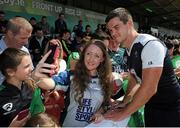 14 July 2015; Ireland's Jonathan Sexton poses for a photo with Sarah Muldoon, a supporter from Athlone, during squad training. Sportsground, Galway. Picture credit: Seb Daly / SPORTSFILE