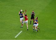11 July 2015; Referee Rory Hickey throws the ball up to start the second half between Tipperary players, Colin O'Riordan, left, and Peter Acheson, and Louth players, Tommy Durnin, left, and Bevan Duffy. GAA Football All-Ireland Senior Championship, Round 2B, Tipperary v Louth, Semple Stadium, Thurles, Co. Tipperary. Picture credit: Ray McManus / SPORTSFILE
