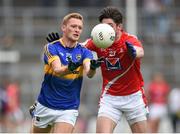11 July 2015; Colm O'Shaughnessy, Tipperary, in action against Eoin O'Connor, Louth. GAA Football All-Ireland Senior Championship, Round 2B, Tipperary v Louth, Semple Stadium, Thurles, Co. Tipperary. Picture credit: Stephen McCarthy / SPORTSFILE