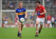 11 July 2015; Colm O'Shaughnessy, Tipperary, in action against Eoin O'Connor, Louth. GAA Football All-Ireland Senior Championship, Round 2B, Tipperary v Louth, Semple Stadium, Thurles, Co. Tipperary. Picture credit: Stephen McCarthy / SPORTSFILE