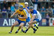 15 July 2015; Bobby Duggan, Clare, in action against Austin Gleeson, Waterford. Bord Gáis Energy Munster GAA u21 Hurling Championship, Semi-Final, Clare v Waterford, Cusack Park, Ennis, Co. Clare. Picture credit: Diarmuid Greene / SPORTSFILE