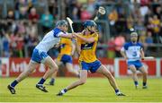 15 July 2015; Bobby Duggan, Clare, in action against Austin Gleeson, Waterford. Bord Gáis Energy Munster GAA u21 Hurling Championship, Semi-Final, Clare v Waterford, Cusack Park, Ennis, Co. Clare. Picture credit: Diarmuid Greene / SPORTSFILE
