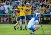15 July 2015; Clare's Conor Cleary, right, Ben O'Gorman, centre, and Michael O'Malley celebrate at the final whistle after defeating Waterford. Bord Gáis Energy Munster GAA u21 Hurling Championship, Semi-Final, Clare v Waterford, Cusack Park, Ennis, Co. Clare. Picture credit: Diarmuid Greene / SPORTSFILE