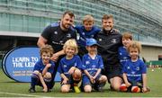 16 July 2015; Cian Healy and Gordon D'Arcy of Leinster Rugby came out to the Bank of Ireland Summer Camp to meet up with some local young rugby talent at Lansdowne FC. Pictured are Cian Healy and Gordon D'Arcy with participants of the summer camp. Lansdowne FC, Lansdowne Road, Dublin. Picture credit: Seb Daly / SPORTSFILE