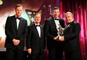 17 October 2008; Brendan Cummins of Tipperary is presented with his GAA All-Star award by Nickey Brennan, GAA President, in the company of Minister for Arts, Sport and Tourism, Martin Cullen T.D., and Charles Butterworth, CEO Vodafone Ireland, left, during the 2008 GAA All-Stars sponsored by Vodafone. Citywest Hotel, Conference, Leisure & Golf Resort, Dublin. Picture credit: Brendan Moran / SPORTSFILE