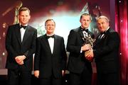 17 October 2008; Michael Kavanagh of Kilkenny is presented with his GAA All-Star award by Nickey Brennan, GAA President, in the company of Minister for Arts, Sport and Tourism, Martin Cullen T.D., and Charles Butterworth, CEO Vodafone Ireland, right, during the 2008 GAA All-Stars sponsored by Vodafone. Citywest Hotel, Conference, Leisure & Golf Resort, Dublin. Picture credit: Brendan Moran / SPORTSFILE