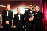 17 October 2008; Conor O'Mahony of Tipperary is presented with his GAA All-Star award by Nickey Brennan, GAA President, in the company of Minister for Arts, Sport and Tourism, Martin Cullen T.D., and Charles Butterworth, CEO Vodafone Ireland, left, during the 2008 GAA All-Stars sponsored by Vodafone. Citywest Hotel, Conference, Leisure & Golf Resort, Dublin. Picture credit: Brendan Moran / SPORTSFILE