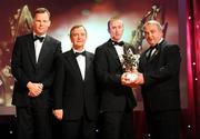 17 October 2008; James 'Cha' Fitzpatrick of Kilkenny is presented with his GAA All-Star award by Nickey Brennan, GAA President, in the company of Minister for Arts, Sport and Tourism, Martin Cullen T.D., and Charles Butterworth, CEO Vodafone Ireland, left, during the 2008 GAA All-Stars sponsored by Vodafone. Citywest Hotel, Conference, Leisure & Golf Resort, Dublin. Picture credit: Brendan Moran / SPORTSFILE