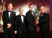 17 October 2008; Shane McGrath of Tipperary is presented with his GAA All-Star award by Nickey Brennan, GAA President, in the company of Minister for Arts, Sport and Tourism, Martin Cullen T.D., and Charles Butterworth, CEO Vodafone Ireland, left, during the 2008 GAA All-Stars sponsored by Vodafone. Citywest Hotel, Conference, Leisure & Golf Resort, Dublin. Picture credit: Brendan Moran / SPORTSFILE