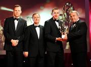17 October 2008; Eddie Brennan of Kilkenny is presented with his GAA All-Star award by Nickey Brennan, GAA President, in the company of Minister for Arts, Sport and Tourism, Martin Cullen T.D., and Charles Butterworth, CEO Vodafone Ireland, left, during the 2008 GAA All-Stars sponsored by Vodafone. Citywest Hotel, Conference, Leisure & Golf Resort, Dublin. Picture credit: Brendan Moran / SPORTSFILE