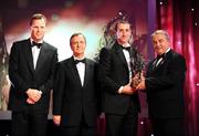 17 October 2008; Eoin Larkin of Kilkenny is presented with his GAA All-Star Hurler of the Year award by Nickey Brennan, GAA President, in the company of Minister for Arts, Sport and Tourism, Martin Cullen T.D., and Charles Butterworth, CEO Vodafone Ireland, left, during the 2008 GAA All-Stars sponsored by Vodafone. Citywest Hotel, Conference, Leisure & Golf Resort, Dublin. Picture credit: Brendan Moran / SPORTSFILE