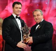 17 October 2008; Enda McGinley of Tyrone is presented with his GAA All-Star award by Nickey Brennan, GAA President, during the 2008 GAA All-Stars sponsored by Vodafone. Citywest Hotel, Conference, Leisure & Golf Resort, Dublin. Picture credit: Brendan Moran / SPORTSFILE
