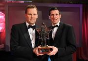 17 October 2008; Sean Cavanagh of Tyrone with his Vodafone GAA All-Star Footballer of the Year award and Charles Butterworth, CEO Vodafone Ireland, at the GAA All-Stars Awards 2008 sponsored by Vodafone. Citywest Hotel, Conference, Leisure & Golf Resort, Dublin. Picture credit: Ray McManus / SPORTSFILE