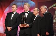 17 October 2008; Joe Canning of Galway with his GAA All-Star Young Hurler of the Year award in the company of Charles Butterworth, CEO Vodafone Ireland, left, Minister for Arts, Sport and Tourism, Martin Cullen T.D., and Nickey Brennan, GAA President, right, during the 2008 GAA All-Stars sponsored by Vodafone. Citywest Hotel, Conference, Leisure & Golf Resort, Dublin. Picture credit: Ray McManus / SPORTSFILE