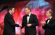 17 October 2008; Sean Cavanagh of Tyrone is congratulated by Charles Butterworth, CEO Vodafone Ireland, left, and Minister for Arts, Sport and Tourism, Martin Cullen T.D., after being announced GAA All-Star Footballer of the Year during the 2008 GAA All-Stars sponsored by Vodafone. Citywest Hotel, Conference, Leisure & Golf Resort, Dublin. Picture credit: Ray McManus / SPORTSFILE