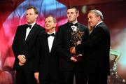 17 October 2008; Shane McGrath of Tipperary is presented with his GAA All-Star award by Nickey Brennan, GAA President, in the company of Minister for Arts, Sport and Tourism, Martin Cullen T.D., and Charles Butterworth, CEO Vodafone Ireland, left, during the 2008 GAA All-Stars sponsored by Vodafone. Citywest Hotel, Conference, Leisure & Golf Resort, Dublin. Picture credit: Ray McManus / SPORTSFILE