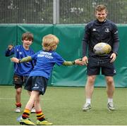 16 July 2015; Cian Healy and Gordon D'Arcy of Leinster Rugby came out to the Bank of Ireland Summer Camp to meet up with some local young rugby talent at Lansdowne FC. Pictured is Gordon D'Arcy taking part in a team game with participants of the summer camp. Lansdowne FC, Lansdowne Road, Dublin. Picture credit: Seb Daly / SPORTSFILE