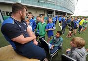 16 July 2015; Cian Healy and Gordon D'Arcy of Leinster Rugby came out to the Bank of Ireland Summer Camp to meet up with some local young rugby talent at Lansdowne FC. Pictured is Cian Healy being asked questions about his career by participants of the summer camp. Lansdowne FC, Lansdowne Road, Dublin. Picture credit: Seb Daly / SPORTSFILE
