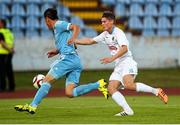 16 July 2015; Nicolas Gorosito, Slovan Bratislava, in action against Ryan Swan, UCD. UEFA Europa League, 2nd Qualifying Round, 1st Leg, Slovan Bratislava v UCD. Štadión Pasienky, Bratislava, Slovakia. Picture credit: Christian Ort / SPORTSFILE