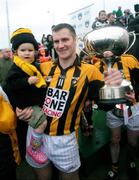 19 October 2008; John McEntee, Crossmaglen, celebrates with the Billy McCorry Man of the Match cup alongside his daughter Katie. Armagh Senior Football Final, Crossmaglen v Pearse Og, Athletic Grounds, Armagh. Picture credit: Oliver McVeigh / SPORTSFILE