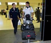 19 October 2008; Ireland's Graham Canty, right, with GAA Operations manager Fergal McGill arrive at Perth Airport for the 2008 International Rules tour. Perth, Australia. Picture credit: Tony McDonough / SPORTSFILE