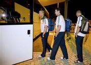 19 October 2008; Ireland's, from left to right, John Keane, David Gallagher and Pearse O'Neill make their way onto the team bus after arriving at Perth Airport for the 2008 International Rules tour. Perth, Australia. Picture credit: Tony McDonough / SPORTSFILE