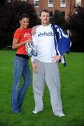 20 October 2008; Rehab has teamed up with some of Ireland’s most prominent sporting figures in a unique fundraising initiative ahead of the Dublin City Marathon on Monday, 27th October, in which former Ireland and Leinster star, Eric Miller will be representing Rehab. The fundraising initiative will see the online auction on eBay of exclusive sporting memorabilia, donated by sporting stars like Leinster’s Felipe Contepomi and Rob Kearney, Kilkenny legend, Brian Cody and the Munster Rugby team. Sports fans can log onto www.ebay.ie to bid for items such as Felipe Contepomi’s signed Leinster Jersey, Rob Kearney’s signed boots worn on his Leinster debut, Brian Cody’s trademark peaked cap, which he wore when Kilkenny won their historic three in a row, a Munster jersey signed by the team and much more. The auction will run from Monday, 20th October, with the bids closing on Saturday on October 25th. Fans who miss out but still want to directly contribute to Eric’s marathon fundraising attempt can log onto www.mycharity.ie/event/ericmiller/. Pictured at the launch are former Leinster and Ireland rugby star Eric Miller and model Glenda Gilson. Fitzwilliam Square, Dublin. Picture credit: Stephen McCarthy / SPORTSFILE