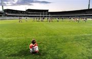 21 October 2008; Seven-year-old Sean Graham watches the action during Ireland International Rules squad training. 2008 International Rules tour, Subiaco Oval, Perth, Australia. Picture credit: Ray McManus / SPORTSFILE