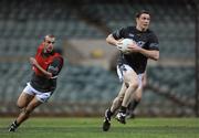 21 October 2008; Enda McGinley, Tyrone, and John Miskella, Cork, in action during Ireland International Rules squad training. 2008 International Rules tour, Subiaco Oval, Perth, Australia. Picture credit: Ray McManus / SPORTSFILE