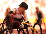 15 September 2008; China's Lisha Huang celebrates after winning the Women's 200m - T53 Final. Beijing Paralympic Games 2008, Women's 200m - T53 Final, National Stadium, Olympic Green, Beijing, China. Picture credit: Brian Lawless / SPORTSFILE
