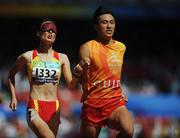 15 September 2008; China's Chunmiao Wu in action during the Women's 200m - T11 heats. Beijing Paralympic Games 2008, Women's 200m - T11, Heat 2, National Stadium, Olympic Green, Beijing, China. Picture credit: Brian Lawless / SPORTSFILE