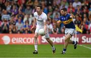 18 July 2015; Sean Cavanagh, Tyrone, in action against Philip Austin, Tipperary. GAA Football All-Ireland Senior Championship, Round 3B, Tipperary v Tyrone. Semple Stadium, Thurles, Co. Tipperary. Picture credit: Diarmuid Greene / SPORTSFILE