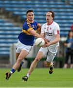 18 July 2015; Colm Cavanagh, Tyrone, in action against Michael Quinlivan, Tipperary. GAA Football All-Ireland Senior Championship, Round 3B, Tipperary v Tyrone. Semple Stadium, Thurles, Co. Tipperary. Picture credit: Diarmuid Greene / SPORTSFILE