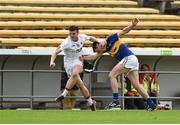 18 July 2015; Connor McAliskey, Tyrone, and Alan Campbell, Tipperary, tussle off the ball. GAA Football All-Ireland Senior Championship, Round 3B, Tipperary v Tyrone. Semple Stadium, Thurles, Co. Tipperary. Picture credit: Diarmuid Greene / SPORTSFILE