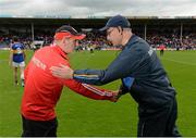 18 July 2015; Tyrone manager Mickey Harte and Tipperary manager Peter Creedon exchange a handshake after the game. GAA Football All-Ireland Senior Championship, Round 3B, Tipperary v Tyrone. Semple Stadium, Thurles, Co. Tipperary. Picture credit: Diarmuid Greene / SPORTSFILE