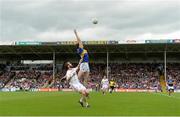 18 July 2015; Michael Quinlivan, Tipperary, in action against Ronan McNamee, Tyrone. GAA Football All-Ireland Senior Championship, Round 3B, Tipperary v Tyrone. Semple Stadium, Thurles, Co. Tipperary. Picture credit: Diarmuid Greene / SPORTSFILE