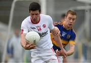 18 July 2015; Sean Cavanagh, Tyrone, in action against Brian Fox, Tipperary. GAA Football All-Ireland Senior Championship, Round 3B, Tipperary v Tyrone. Semple Stadium, Thurles, Co. Tipperary. Picture credit: Diarmuid Greene / SPORTSFILE