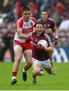 18 July 2015; Michael Lundy, Galway, in action against Eoin Bradley, Derry. GAA Football All-Ireland Senior Championship, Round 3B, Galway v Derry, Pearse Stadium, Salthill, Co. Galway. Photo by Sportsfile