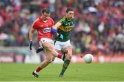18 July 2015; James Loughrey, Cork, in action against David Moran, Kerry. Munster GAA Football Senior Championship Final Replay, Kerry v Cork. Fitzgerald Stadium, Killarney, Co. Kerry. Picture credit: Stephen McCarthy / SPORTSFILE